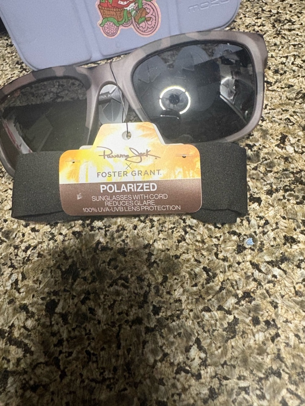 Foster Grant woman’s  Sunglasses – Gray Frame, Black Lenses